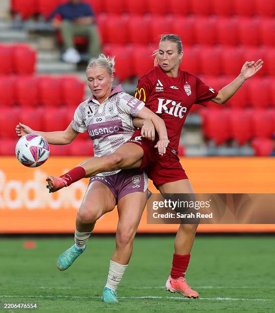 Matilda McNamara of Adelaide United and Tanaye Morris of Brisbane Roar during the round 20 A-League Women's match between Adelaide United and...