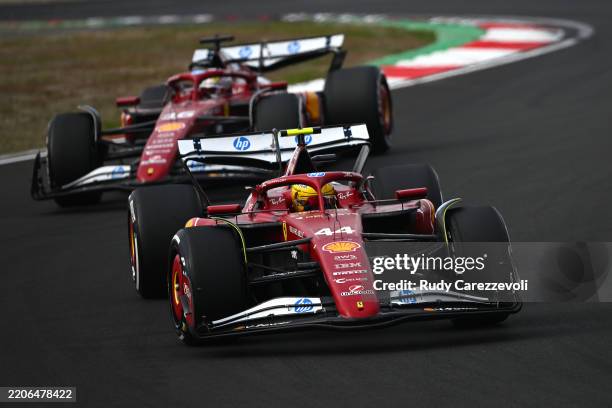 Lewis Hamilton of Great Britain driving the Scuderia Ferrari SF-25 leads Charles Leclerc of Monaco driving the Scuderia Ferrari SF-25 on track during...
