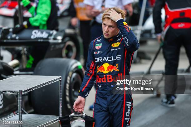 Liam Lawson of New Zealand and Oracle Red Bull Racing walks in parc ferme during the F1 Grand Prix of China at Shanghai International Circuit on...