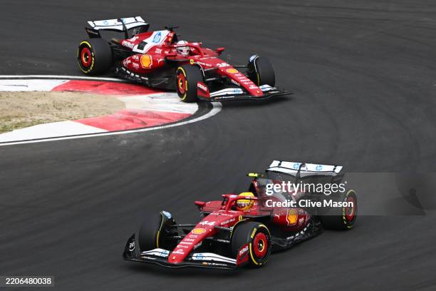 Lewis Hamilton of Great Britain driving the Scuderia Ferrari SF-25 leads Charles Leclerc of Monaco driving the Scuderia Ferrari SF-25 on track during...