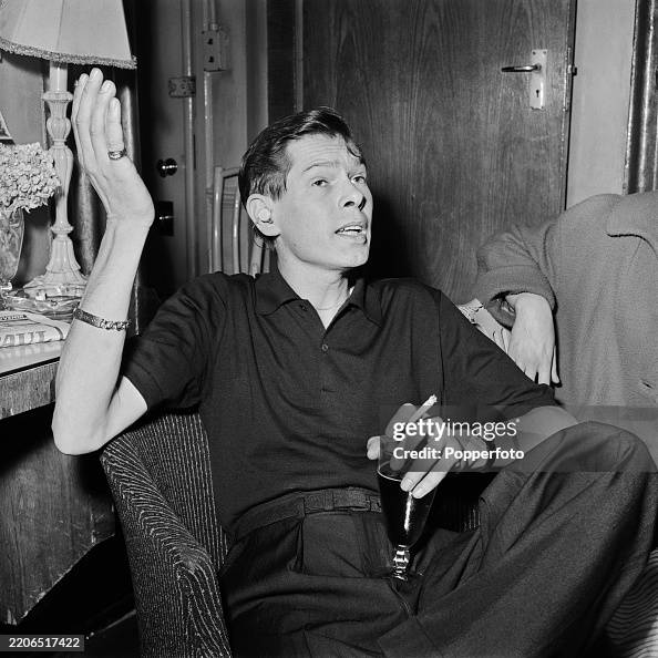 Johnny Singer American singer and musician Johnnie Ray seated backstage at the ...