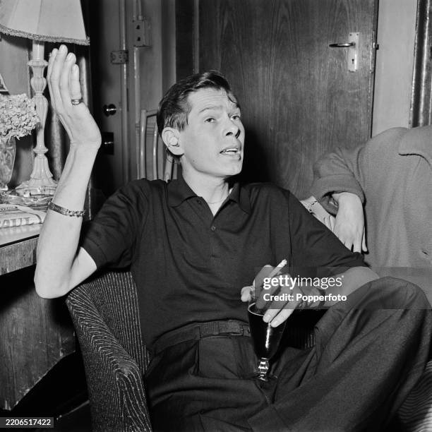 Singer Johnny Rio American singer and musician Johnnie Ray seated backstage at the ...