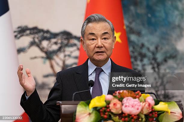 Chinese Foreign Minister Wang Yi speaks during a press conference with French Foreign Minister Jean-Noel Barrot at Diaoyutai State Guest House on...
