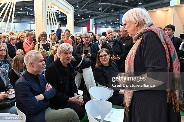 March 2025, Saxony, Leipzig: Claudia Roth , Executive Federal Government Commissioner for Culture and the Media, talks to Karl Ove Knausgard , author...