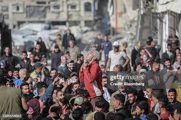Palestinians protest against the Hamas militant group during a demonstration in Beit Lahiya, northern Gaza, on Wednesday, March 26, 2025....