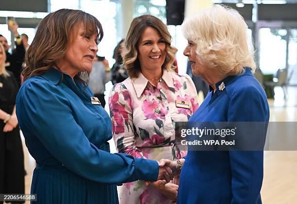 Queen Camilla meets Lorraine Kelly and Susanna Reid during during a reception, on March 27, 2025 in London, England. Accompanied by Dame Carolyn...