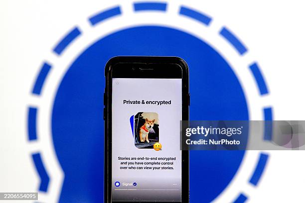 Signal app page on a mobile device is shown in Brampton, Ontario, on March 27, 2025. A national security scandal continues to affect US President...