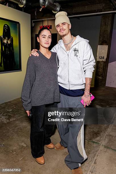 Kim Turnbull and Romeo Beckham attend the Gabriel Moses: Selah Opening Reception at 180 Studios on March 27, 2025 in London, England.