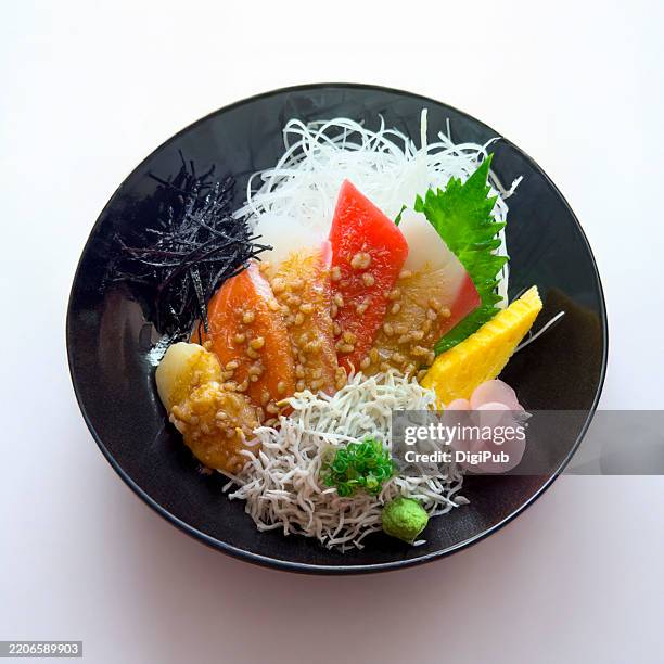 food replica of seafood soy sauce koji marinated rice bowl - dashimaki tamago fotografías e imágenes de stock