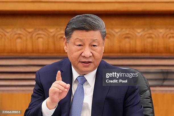 Chinese President Xi Jinping speaks during an international business meeting at The Great Hall Of The People on March 28, 2025 in Beijing, China....