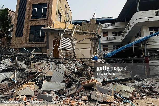 Collapsed building is pictured in Mandalay on March 28 after an earthquake in central Myanmar. A powerful earthquake rocked central Myanmar on March...