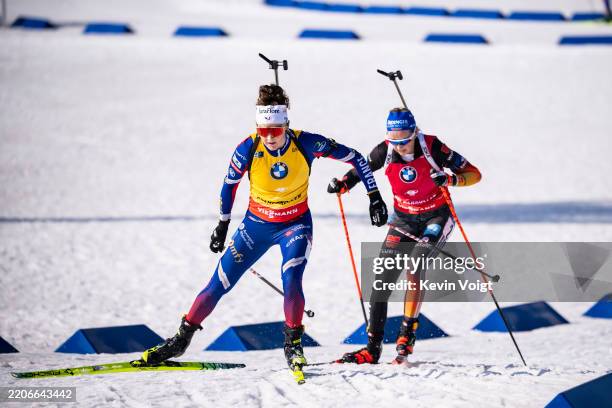 Lou Jeanmonnot of France and Franziska Preuss of Germany in action during the Women 12.5km Mass Start at the BMW IBU World Cup Biathlon Oslo -...