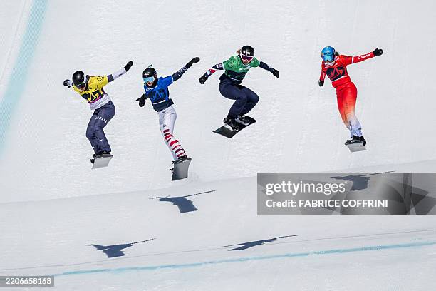 Canada's Meryeta O'Dine, France's Lea Casta, Great Britain's Charlotte Bankes and Switzerland's Sina Siegenthaler compete in the Women's Snowboard...
