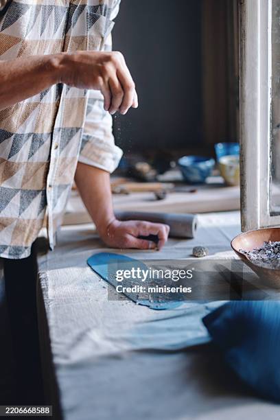 close-up of hands creating handmade pottery in a studio setting - vintage mixing bowls stock pictures, royalty-free photos & images