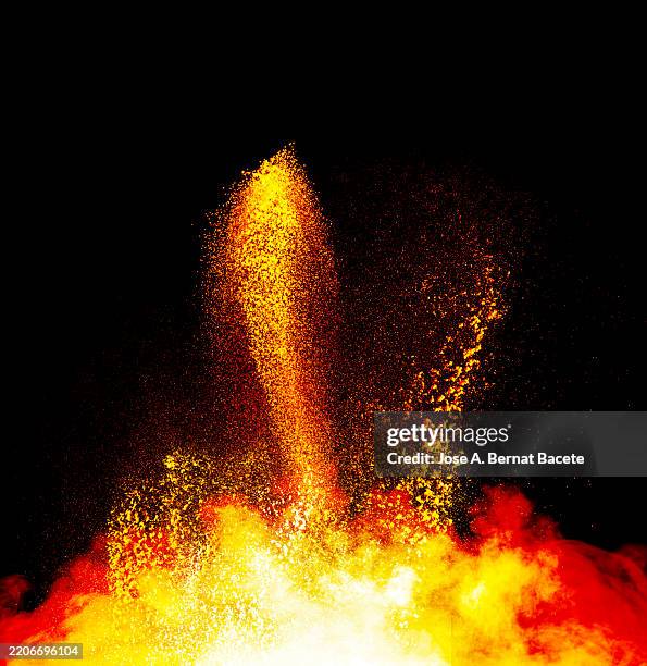 powerful explosion with upward-moving smoke and fire particles on a black background. - dynamite explosion stock pictures, royalty-free photos & images