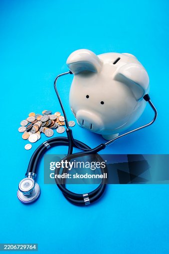 Concept Photo of a White Large Piggy Bank on Blue Background Concept Photo of a White Large Piggy Bank on Blue Background