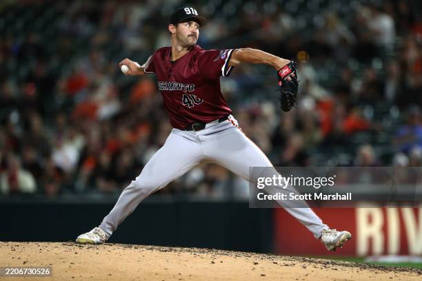 Mason Black of the Sacramento River Cats throws a pitch in the ninth inning against the San Francisco Giants at Sutter Health Park on March 23, 2025...