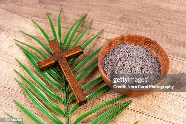 palm leaf, ashes and catholic cross - symbolism stock pictures, royalty-free photos & images
