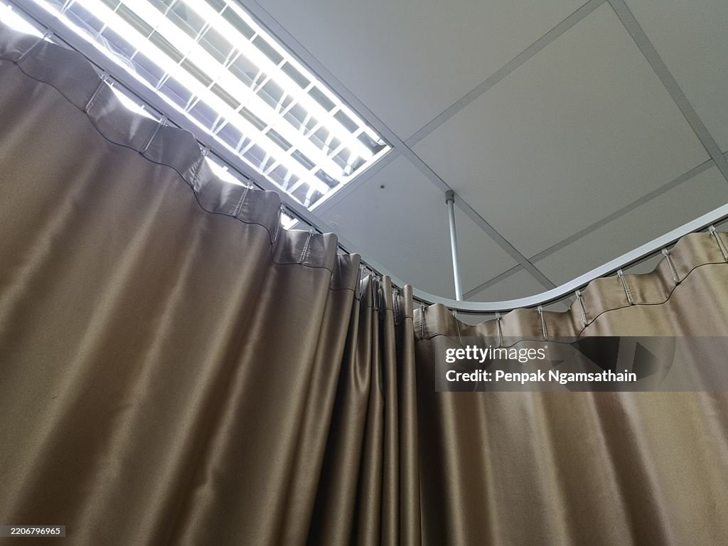 Curved curtain rail