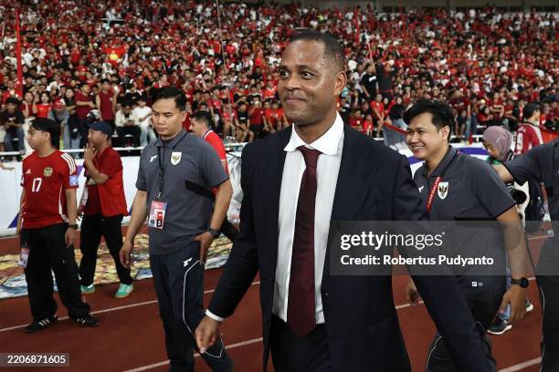 Head coach Patrick Kluivert of Indonesia smiles after the FIFA World Cup qualifier Asian third round Group C match between Indonesia and Bahrain at...