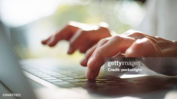 mature woman using laptop. - answering stock pictures, royalty-free photos & images