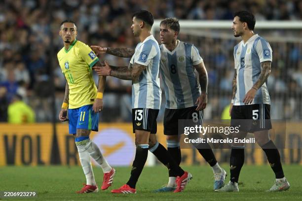 Raphinha of Brazil reacts to Cristian Romero of Argentina during the South of American FIFA World Cup 2026 Qualifier between Argentina and Brazil at...