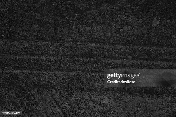 bildbanksillustrationer, clip art samt tecknat material och ikoner med textured effect empty blank plain dark grey black color concrete cemented wall with abstract paint brush strokes over horizontal striped vector background with rough rustic grunge texture like tire tread marks pattern grooved over coal tar asphalt road - asfalt