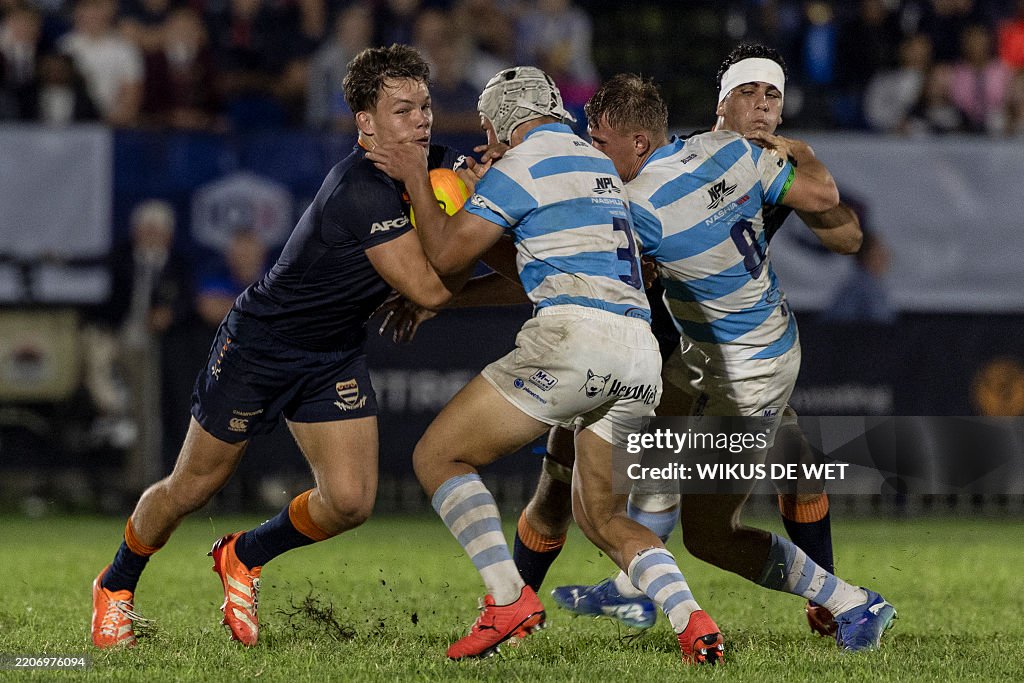 College Rugby Rsa Grey College's captain and flanker Xander Smit hands off... News Photo ...