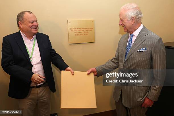 King Charles III unveils a plaque to commemorate the visit at Somerset House on March 26, 2025 in London, England. King Charles III is Patron of The...
