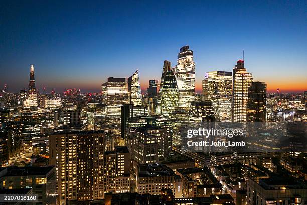 city of london lights - east london london stock-fotos und bilder