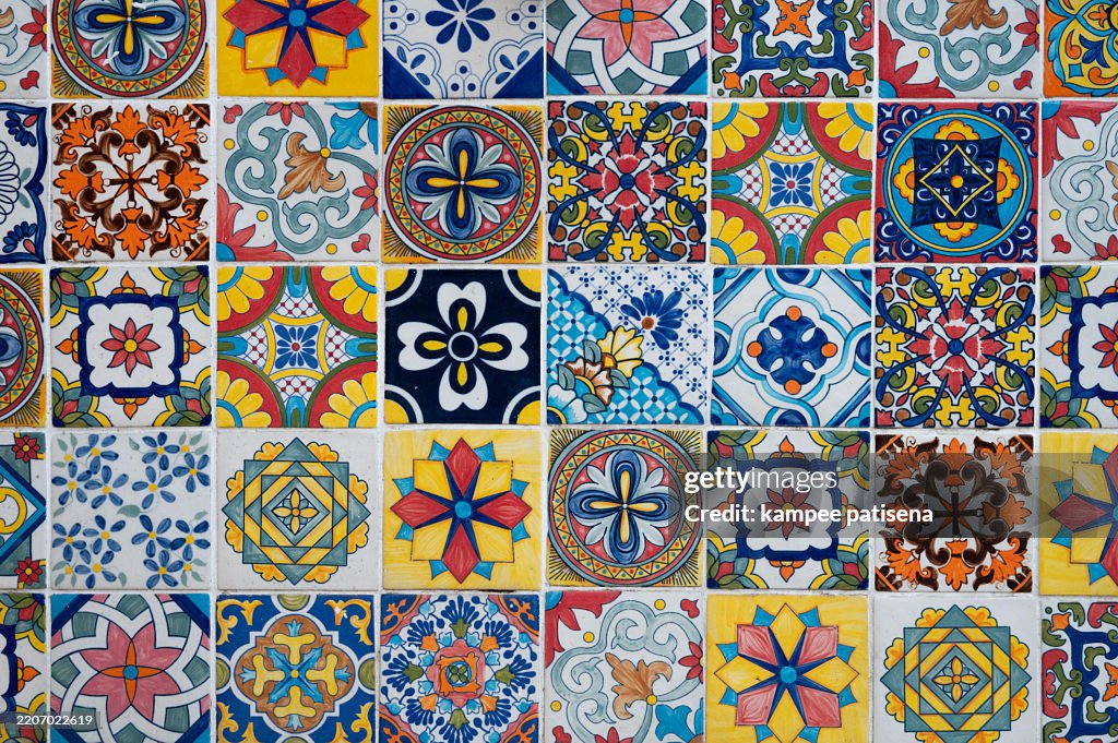 A tile mosaic with many different colored tiles