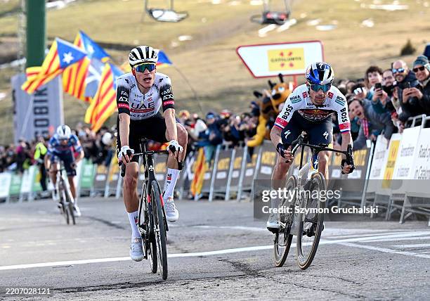 Juan Ayuso of Spain and UAE Team Emirates and Primoz Roglic of Slovenia and Team Red Bull- BORA - Hansgrohe sprint at finish line to win the stage...