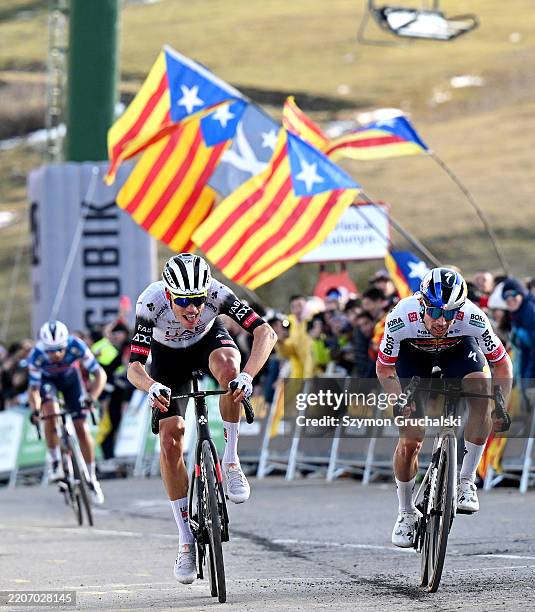 Juan Ayuso of Spain and UAE Team Emirates and Primoz Roglic of Slovenia and Team Red Bull- BORA - Hansgrohe sprint at finish line to win the stage...