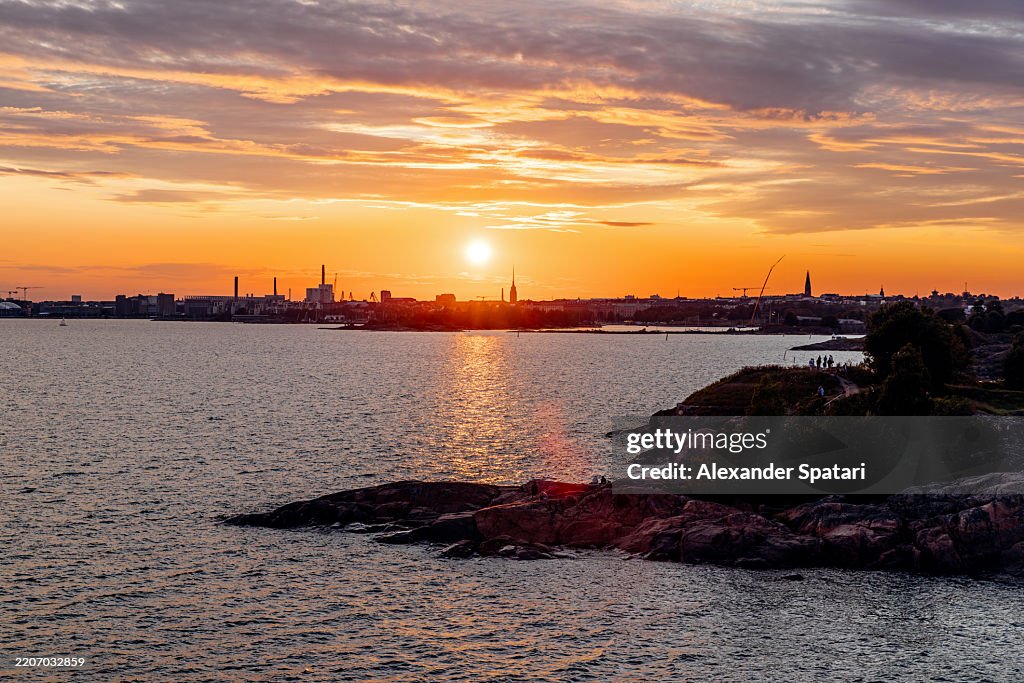 Sunset in Helsinki seen from Suomenlinna island in summer, Finland