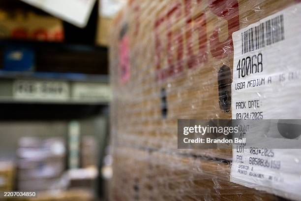 Label is displayed on a box of packaged goods at the Central Texas Food Bank on March 26, 2025 in Austin, Texas. The Texas Central Food Bank,...