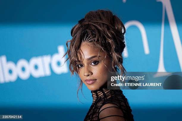 South African singer and songwriter Tyla arrives for the Billboard Women in Music, honoring US rapper and singer Doechii as Billboard Woman of the...