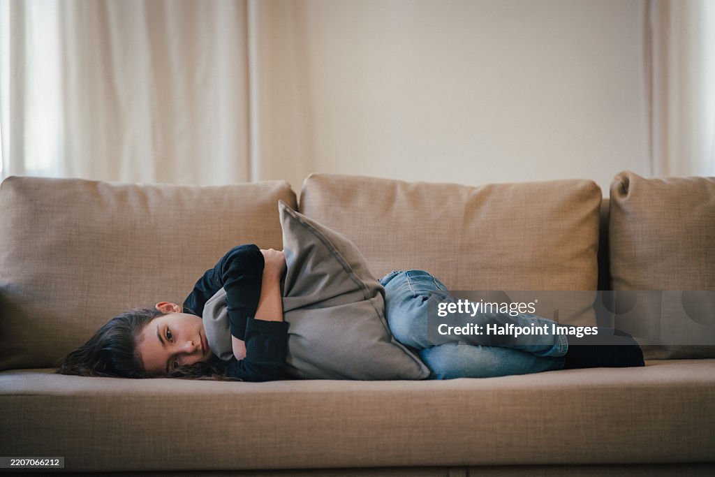 Young girl feeling depressed and sad.