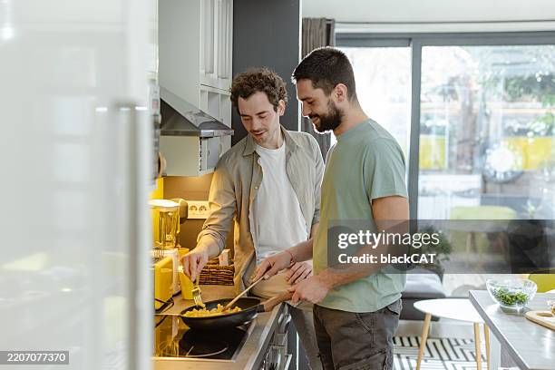 Two Men Cookware 47,341 Men In Black Images Stock Photos, High-Res Pictures, and Images ...