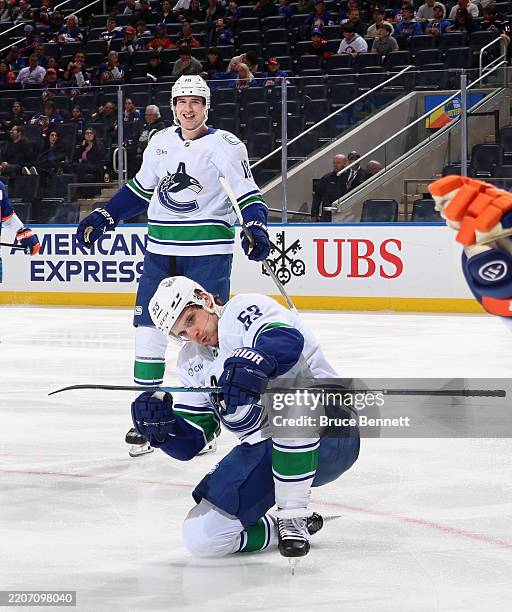 Teddy Blueger of the Vancouver Canucks celebrates his third period goal against the New York Islanders at UBS Arena on March 26, 2025 in Elmont, New...