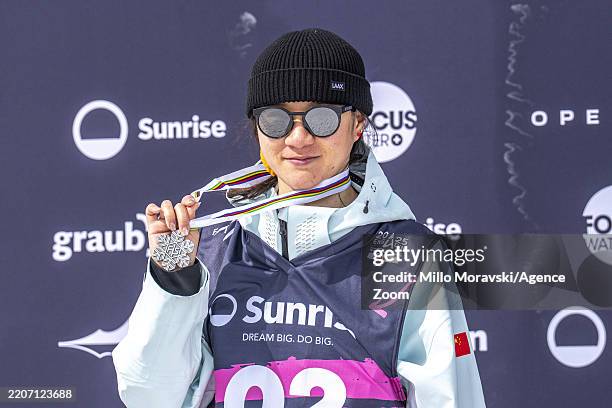 Fanghui Li in action during the FIS Snowboard, Freestyle and Freeski World Championships Day 14 on March 30, 2025 in Engadin, Switzerland.