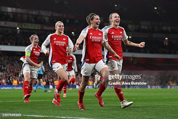 Mariona Caldentey of Arsenal celebrates with teammate Caitlin Foord after scoring her team's second goal during the UEFA Women's Champions League...