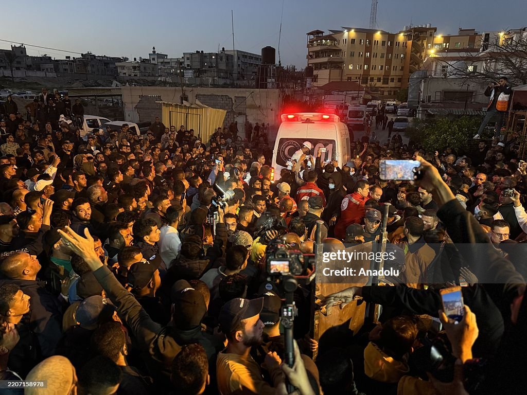 Bodies of civil defense members killed by Israel in Gaza brought to Nasser Hospital