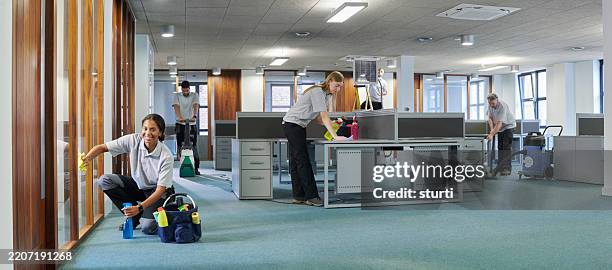 happy commercial cleaning team - carpet cleaner machine stock pictures, royalty-free photos & images