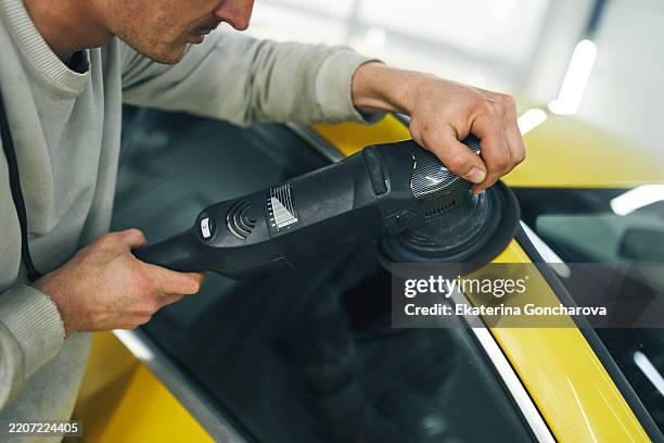 close-up of car detailing and polishing by professional worker - car detailing stock pictures, royalty-free photos & images