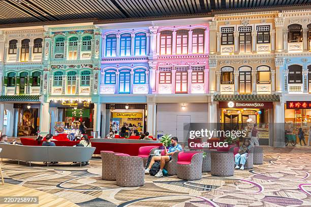 Singapore airport terminal 4, Peranakan traditional shophouses installation in the waiting area in the departures terminal showing heritage landmarks.