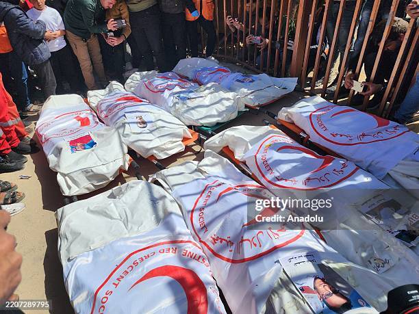 Funerals held at Nasser Hospital in Khan Yunis, located in the southern Gaza Strip, for 8 health workers from the Palestinian Red Crescent who were...