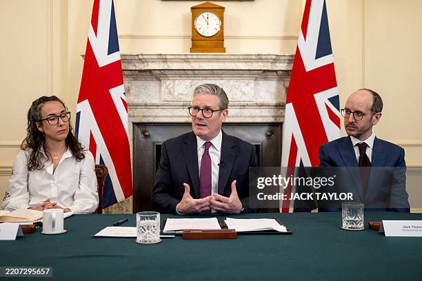 Britain's Prime Minister Keir Starmer holds a roundtable meeting with Sarah Simpkin from the Children's Society and writer Jack Thorne of...