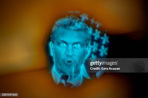 Defense Secretary Pete Hegseth is seen on the viewfinder of a video camera as he speaks during his visit at Camp Aguinaldo on March 28, 2025 in...
