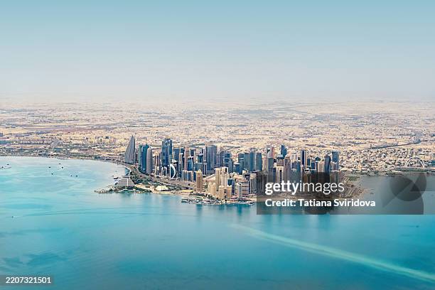 aerial view of the west bank cornice business center in doha, qatar - qatar stock pictures, royalty-free photos & images