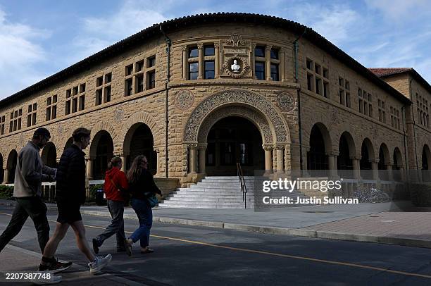 Pedestrians walk on the Stanford University campus on March 28, 2025 in Stanford, California. U.S. Attorney General Pam Bondi is launching a...